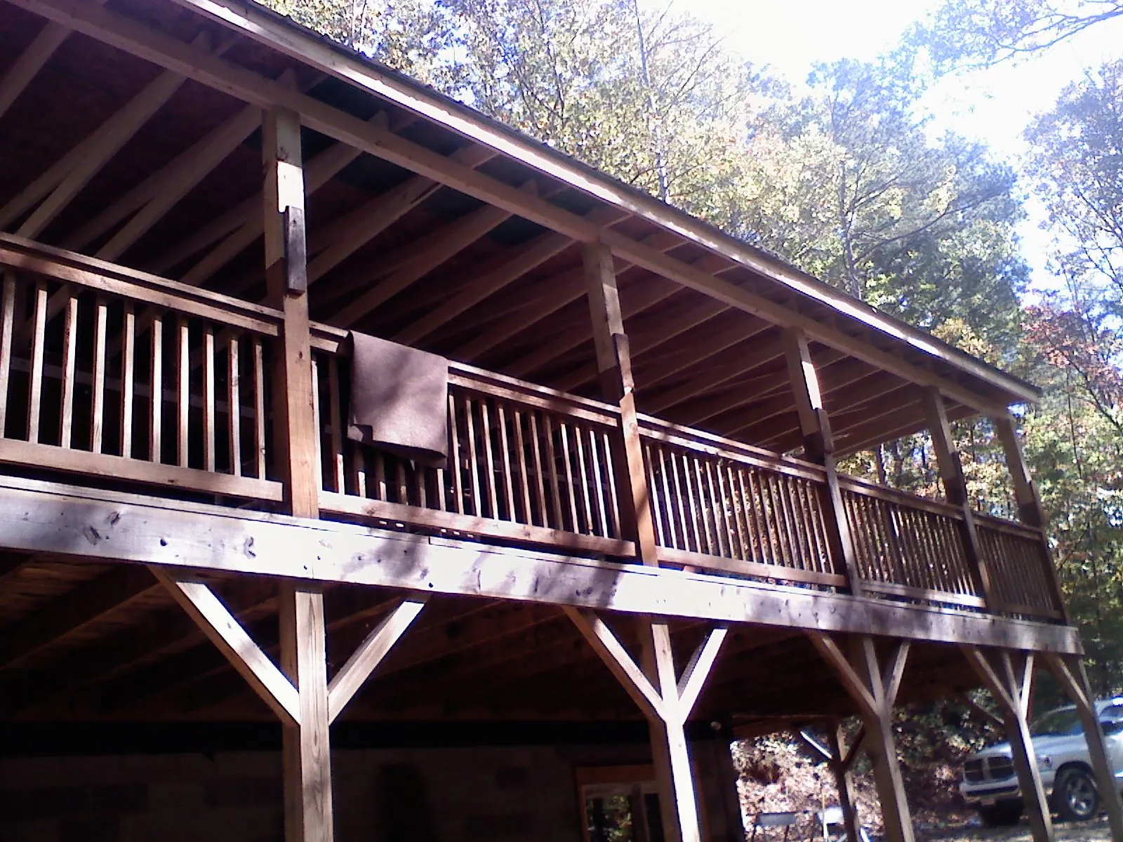 Timber framing under a new elevated porch and deck — Roof Leak Repair in Lewiston by Roofing Brothers